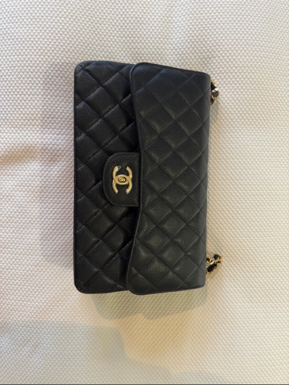 CHANEL Black Quilted Leather Flap Bag with Gold CC Lock
